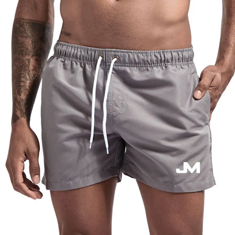 Quick drying, mid-length beach shorts DARK GRAY Beachwear Australia