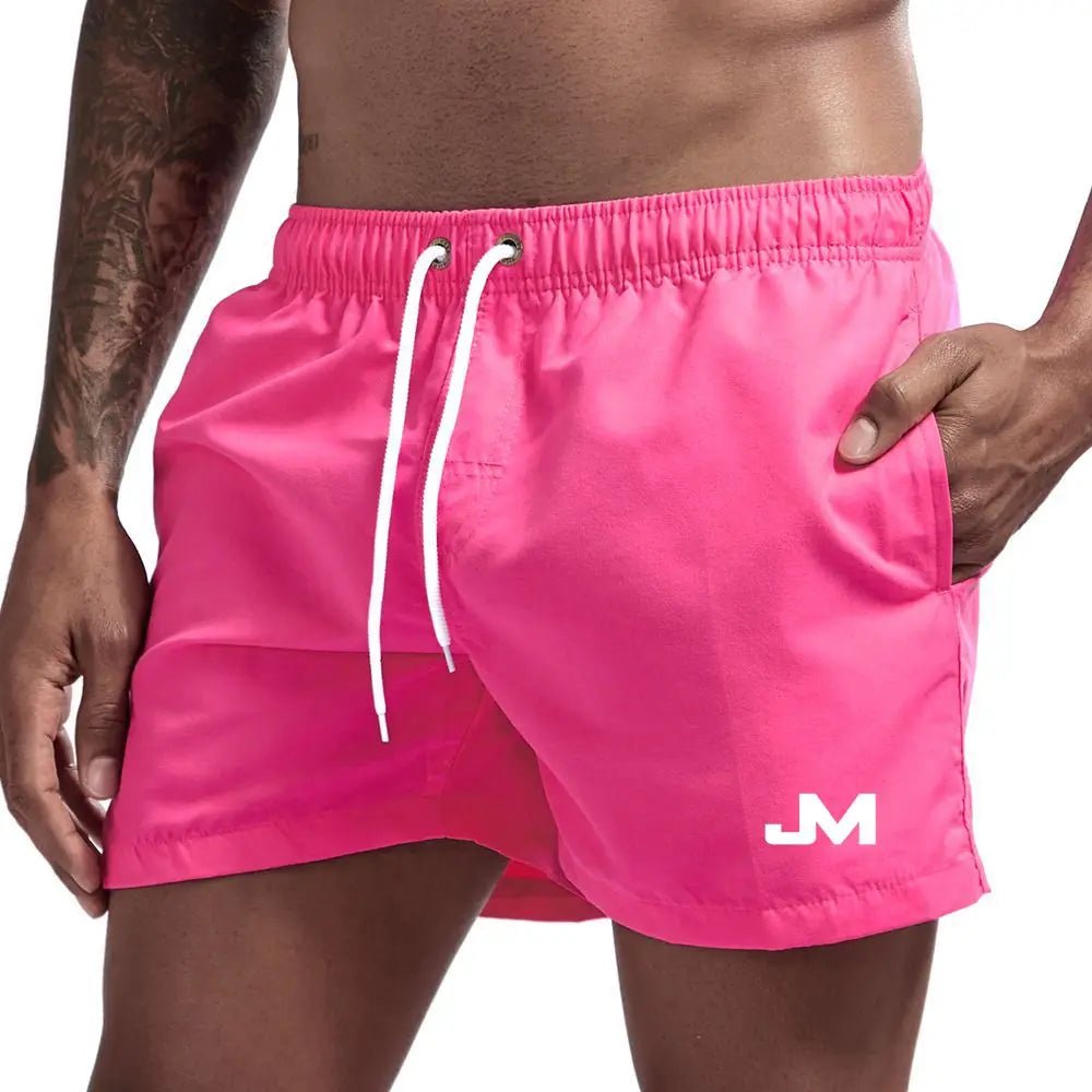 Quick drying, mid-length beach shorts Pink Beachwear Australia